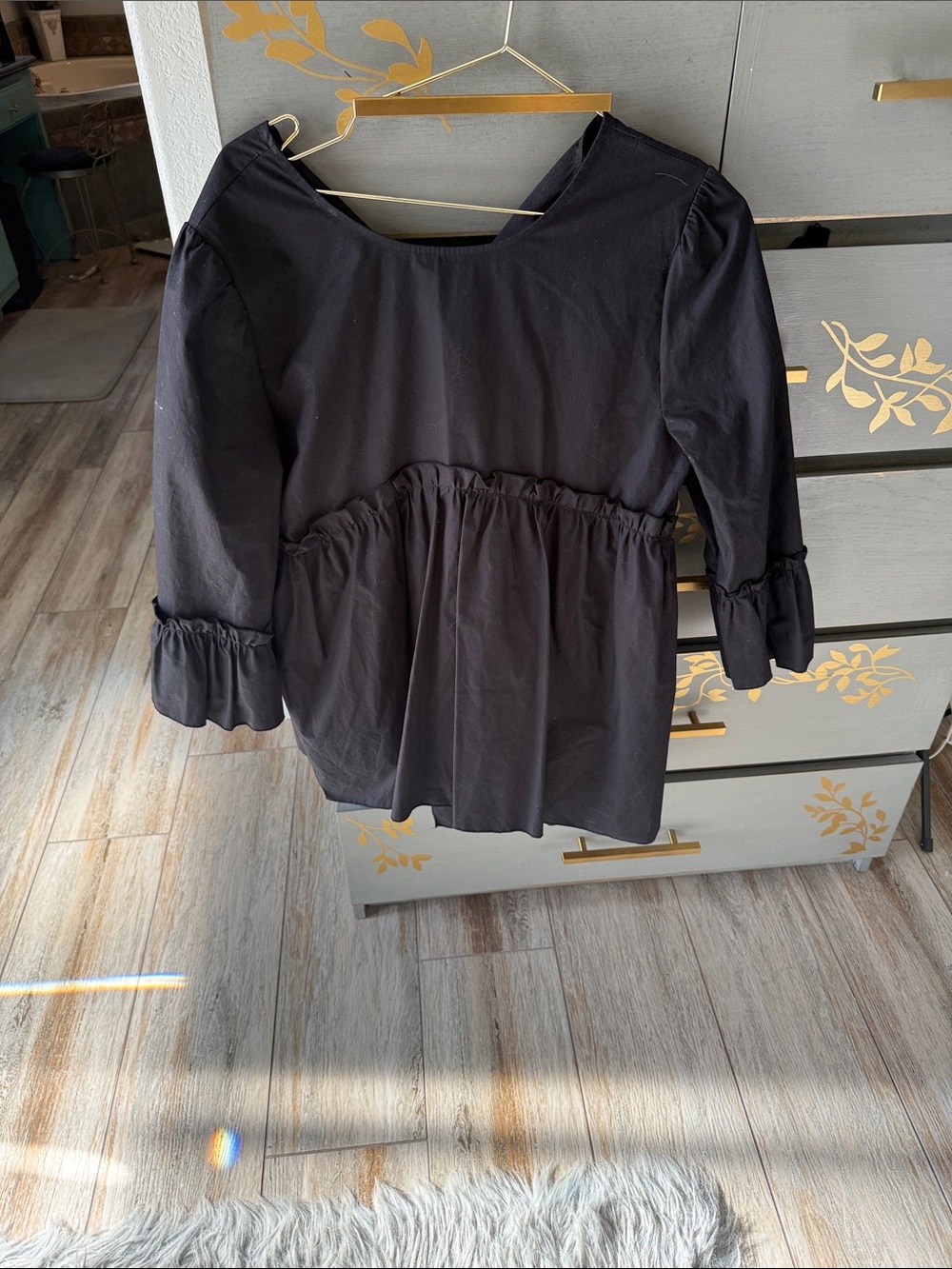 Women’s Black Peplum Tunic with Ruffle Trim
